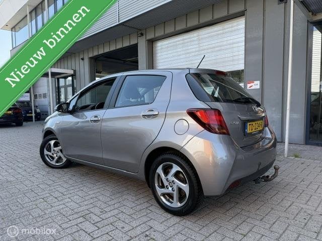 Toyota Yaris 1.5 Hybrid Comfort Full option Camera Automaat, Auto's, Toyota, Gebruikt, Euro 6, 4 cilinders, Bruin