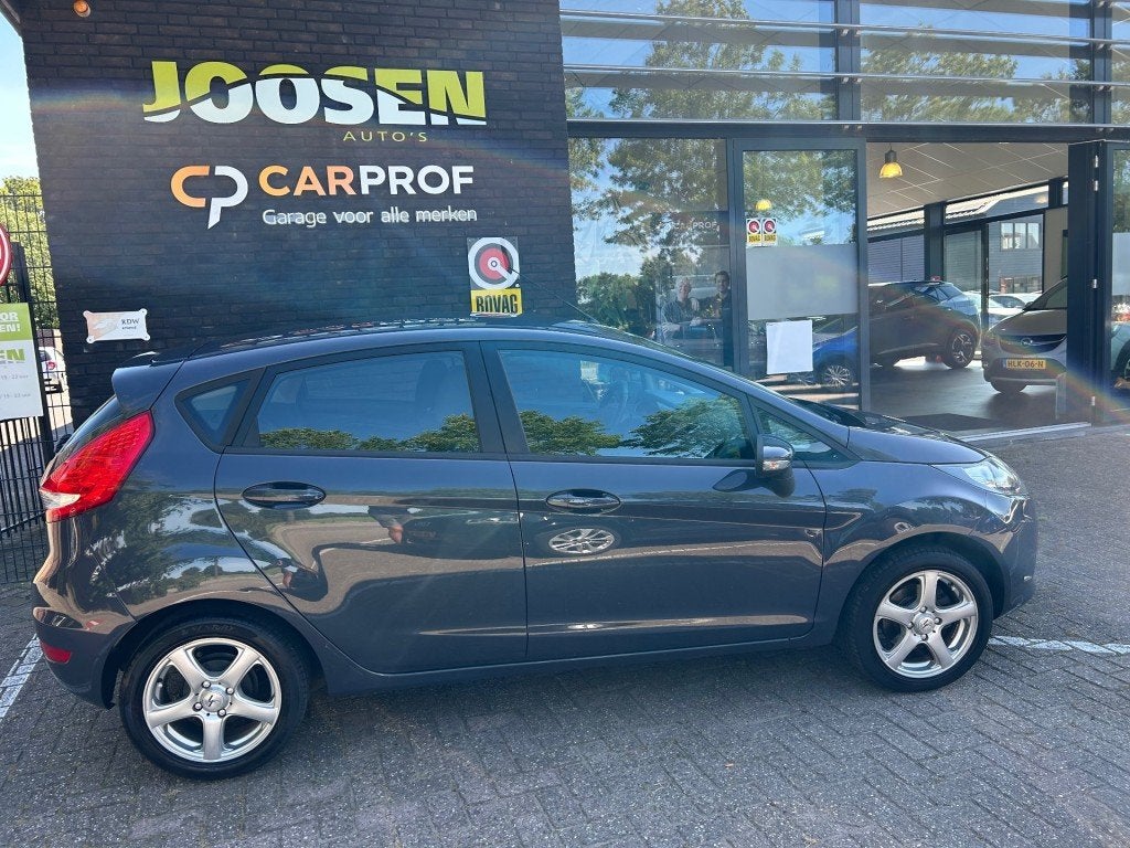 Ford FIESTA 1.25 GHIA, Auto's, Voorwielaandrijving, Euro 5, 4 cilinders, Met garantie (alle)
