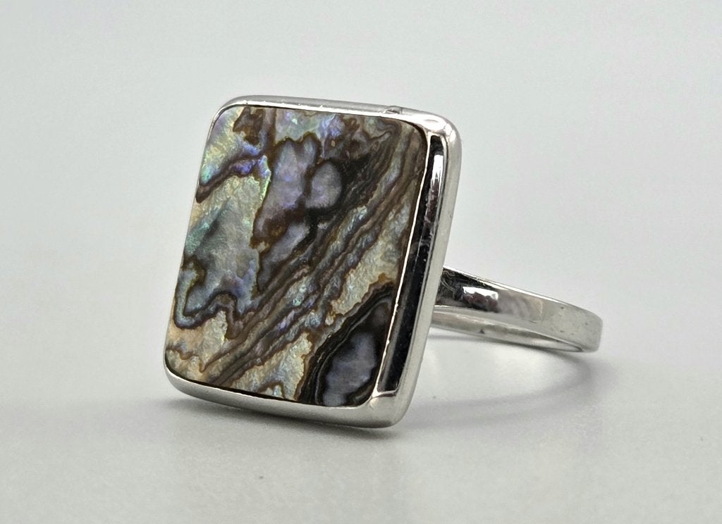 Zilveren ring met edelsteen paua/ abalone schelp. 2026/511, 18 tot 19, Overige kleuren, ., Ophalen of Verzenden
