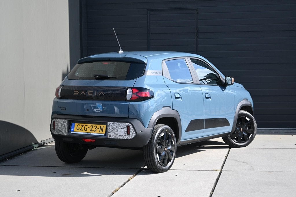 Dacia Spring Extreme 65 26.8 kWh | DC-LADER | CAMERA | NAVI, Gebruikt, Leder en Stof, Origineel Nederlands, Parkeersensor