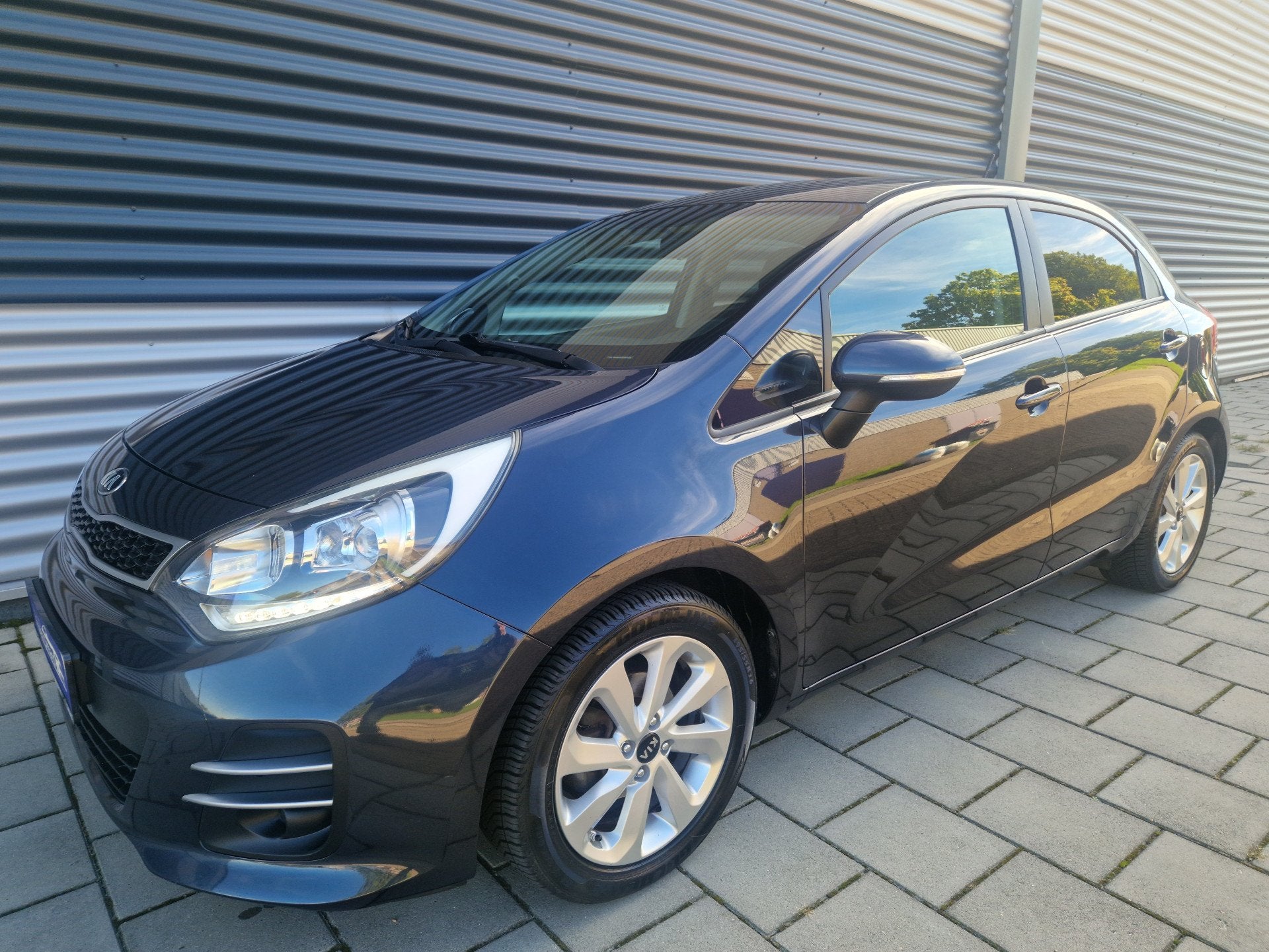 Kia Rio 1.2 CVVT ExecutiveLine (bj 2016), Auto's, Euro 6, 4 cilinders, Blauw, Bedrijf