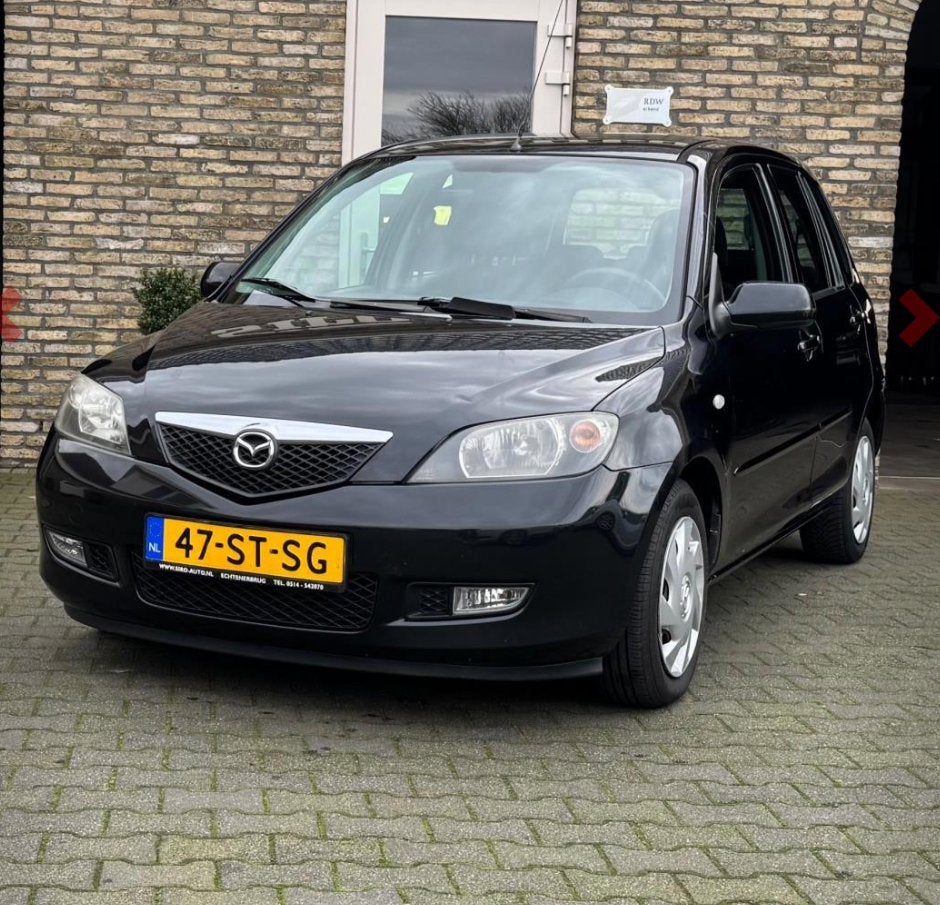Mazda 2 1.4 16V 2006 Zwart, Voorwielaandrijving, 15 km/l, 40 €/maand, 4 cilinders
