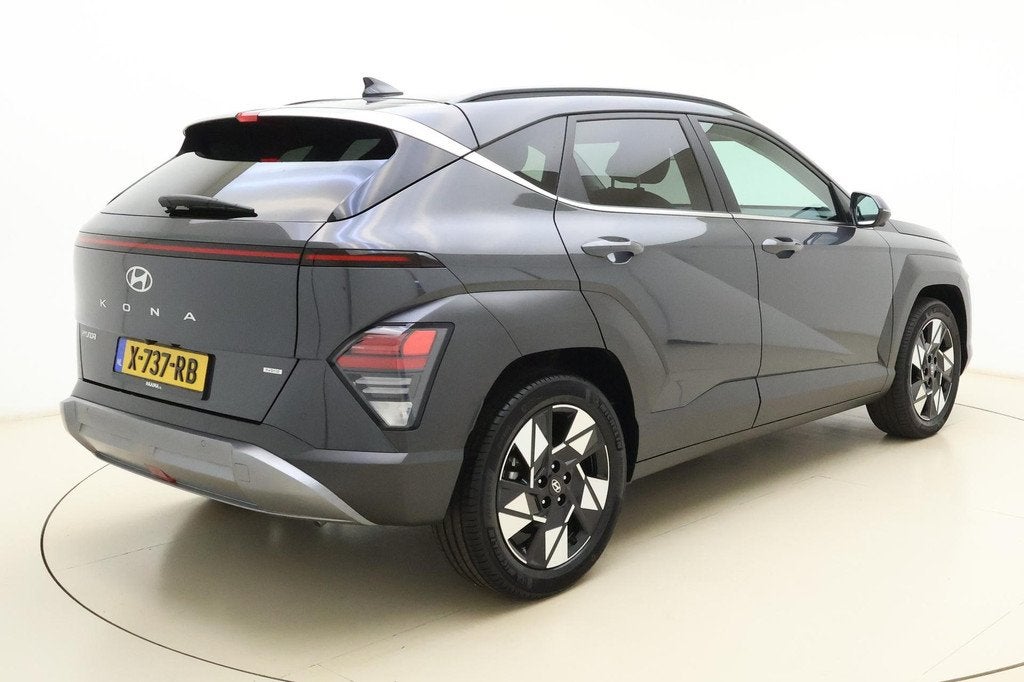 Hyundai Kona 1.6 GDI HEV Premium Automaat | Lederen bekledin, Auto's, Hyundai, Gebruikt, 2 kWh, Lichtsensor, Origineel Nederlands