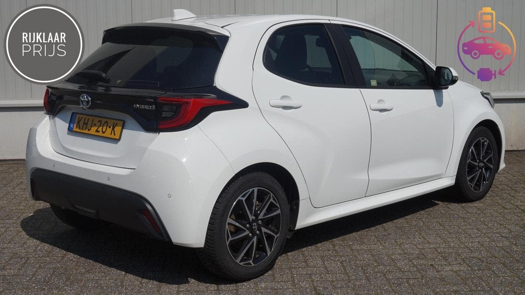 Toyota Yaris 1.5 Hybrid A/T 115PK Clima | Cruise | Carplay, Auto's, 12 maanden, Gebruikt, Euro 6, Wit