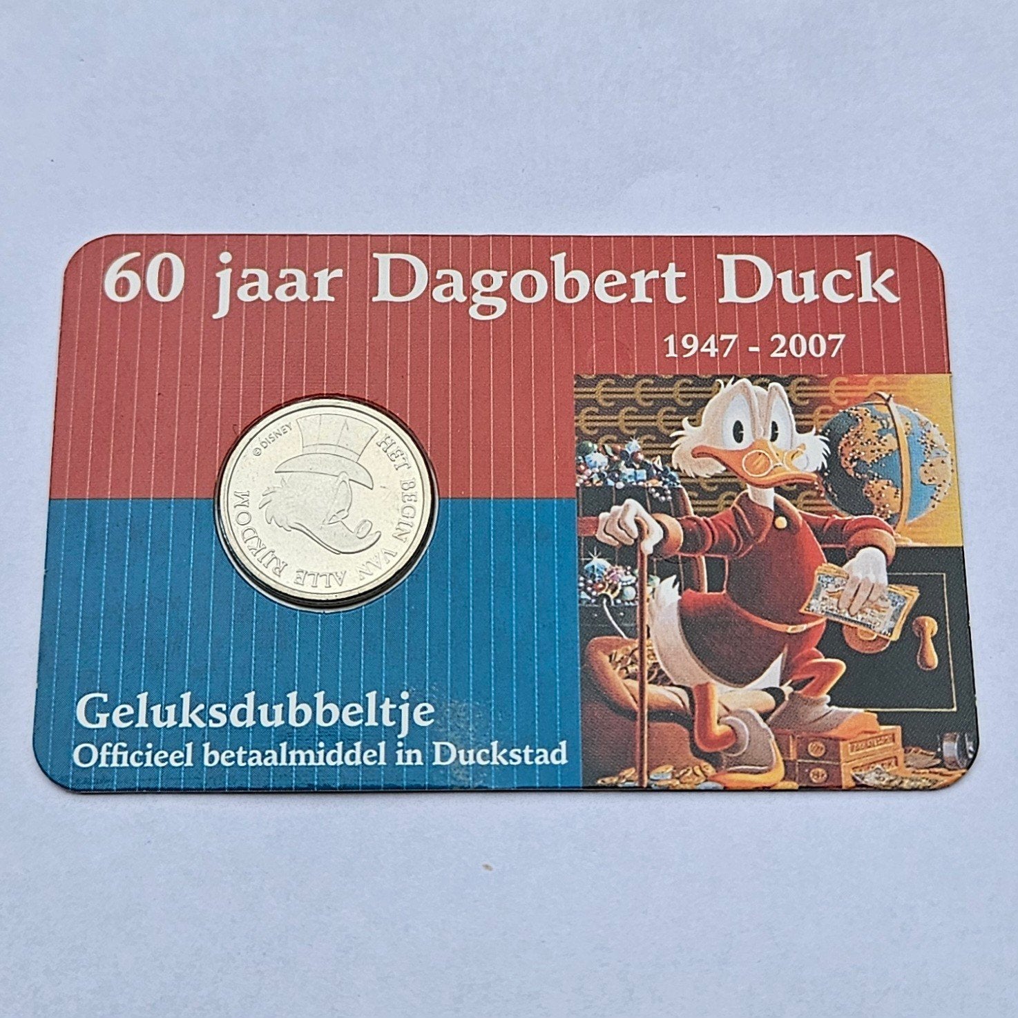 Geluksdubbeltje - 60 jaar Dagobert Duck, Ophalen of Verzenden, Losse munt