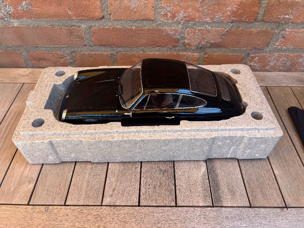 Porsche 911S 1972 1:12 Zwart Merk: Norev nieuw in de doos, Hobby en Vrije tijd, Modelauto's | 1:5 tot 1:12, Ophalen, Nieuw, 1:9 t/m 1:12