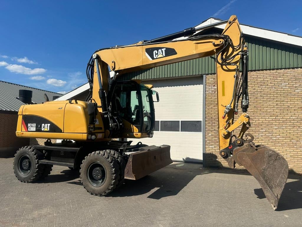 Caterpillar M316D Mobiele Graafmachine, Zakelijke goederen, Machines en Bouw | Kranen en Graafmachines, Ophalen of Verzenden, Graafmachine