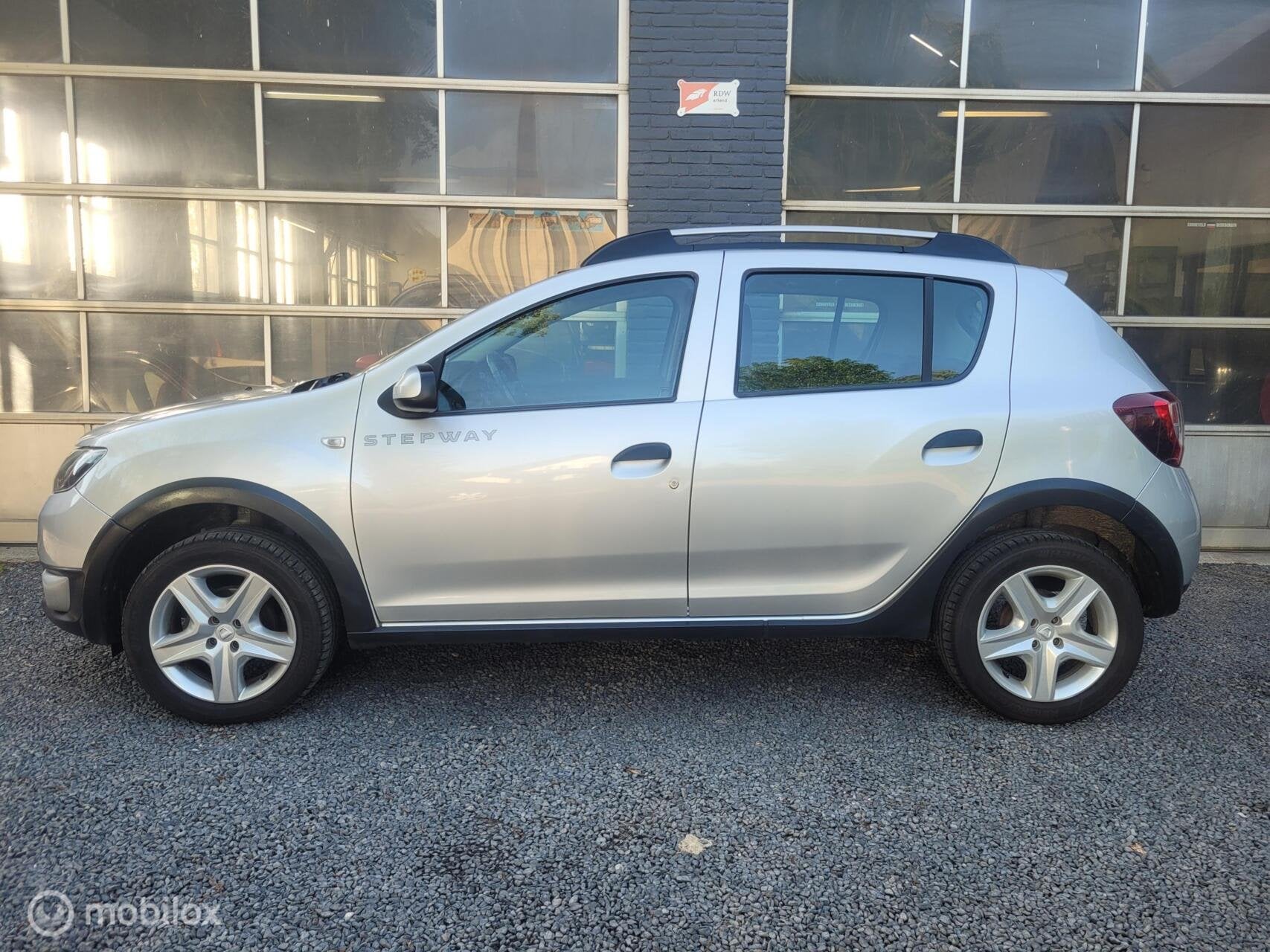 Dacia Sandero 0.9 TCe Stepway | CRUISE | AIRCO | TREKHAAK |, Auto's, Voorwielaandrijving, Stof, Parkeersensor, Origineel Nederlands