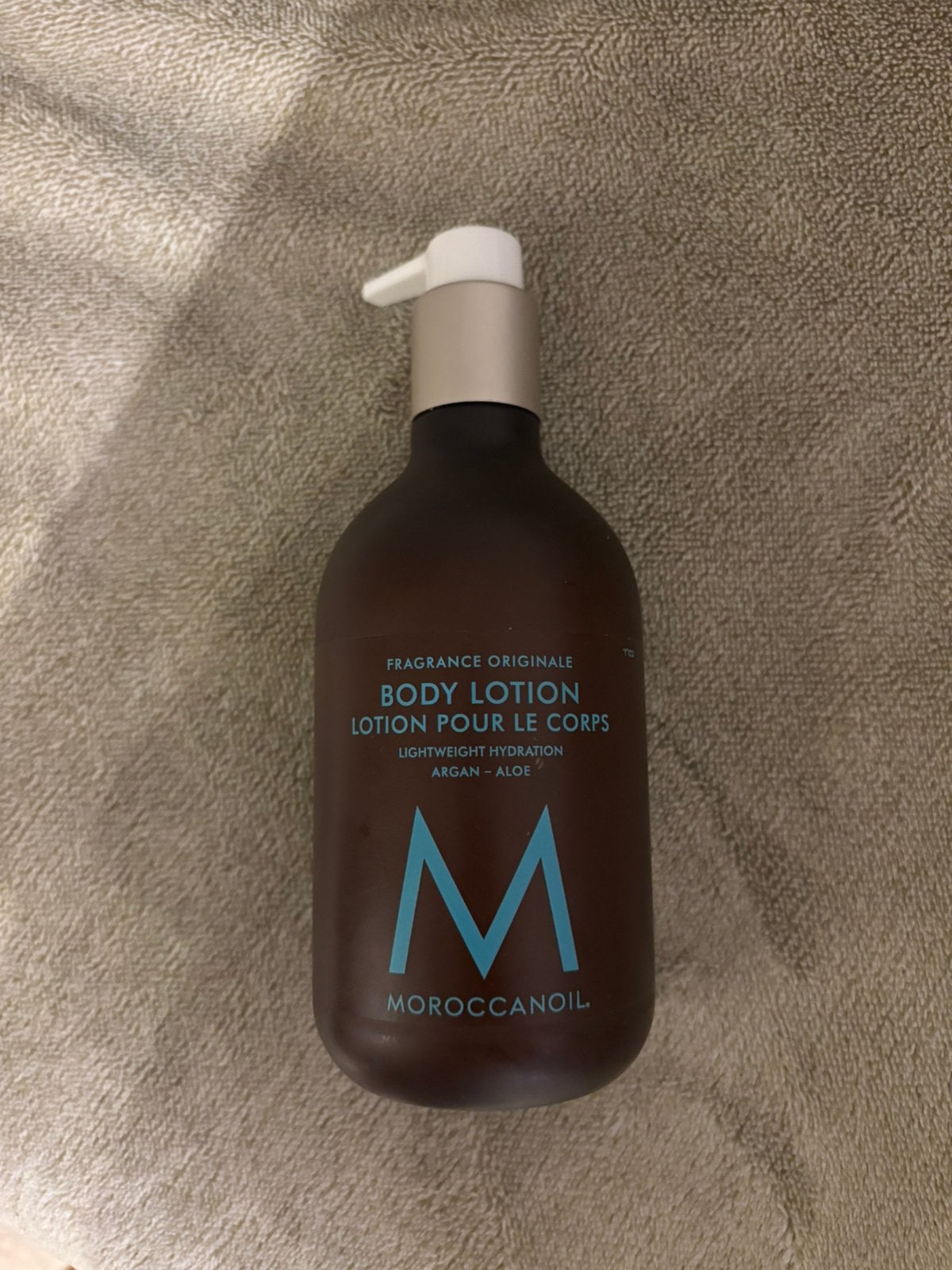 Moroccanoil body lotion, Ophalen of Verzenden, Zo goed als nieuw, Bodylotion, Crème of Olie