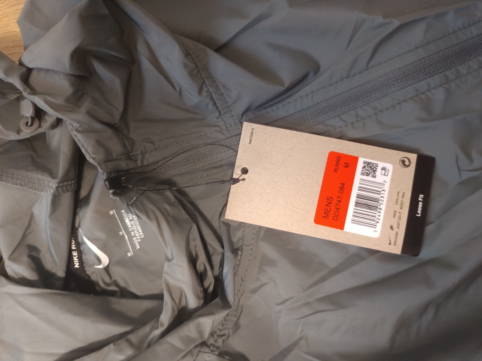 Nike Miller hardloopjack grijs maat M, Maat 48/50 (M), Nike, Nieuw, Ophalen of Verzenden