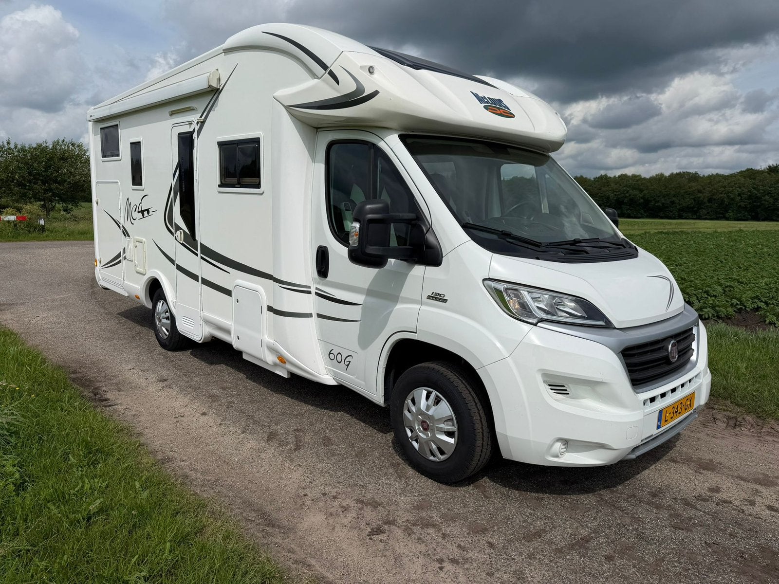 MCLouis MC 4- G60 Airco Garage Hefbed 4 persoons Cruise, Caravans en Kamperen, Campers, Luifel, Ringverwarming, Fiat, Particulier