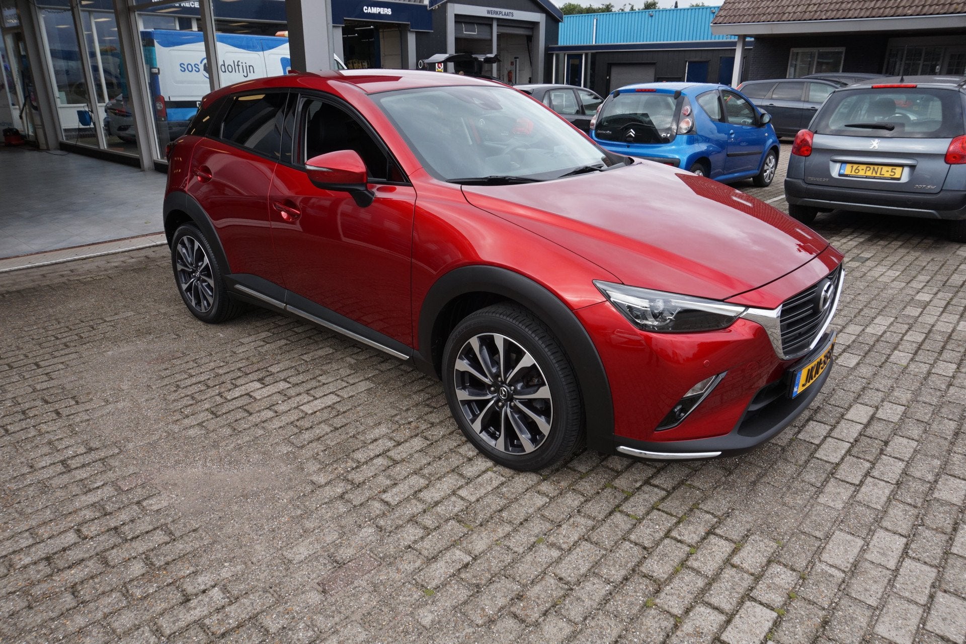 Mazda CX-3 2.0 SkyActiv-G 120 SkyLease Automaat Incl 12 bova, Auto's, Gebruikt, 4 cilinders, 1192 kg, Leder en Stof