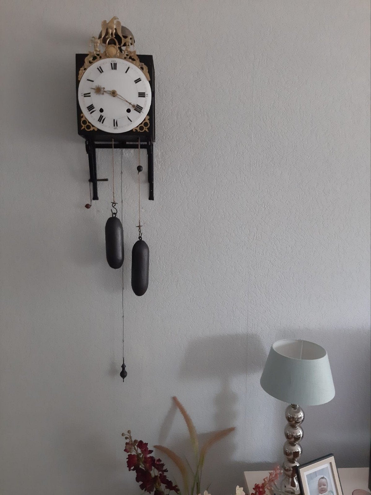 comtoiseklok met Adelaar, Ophalen