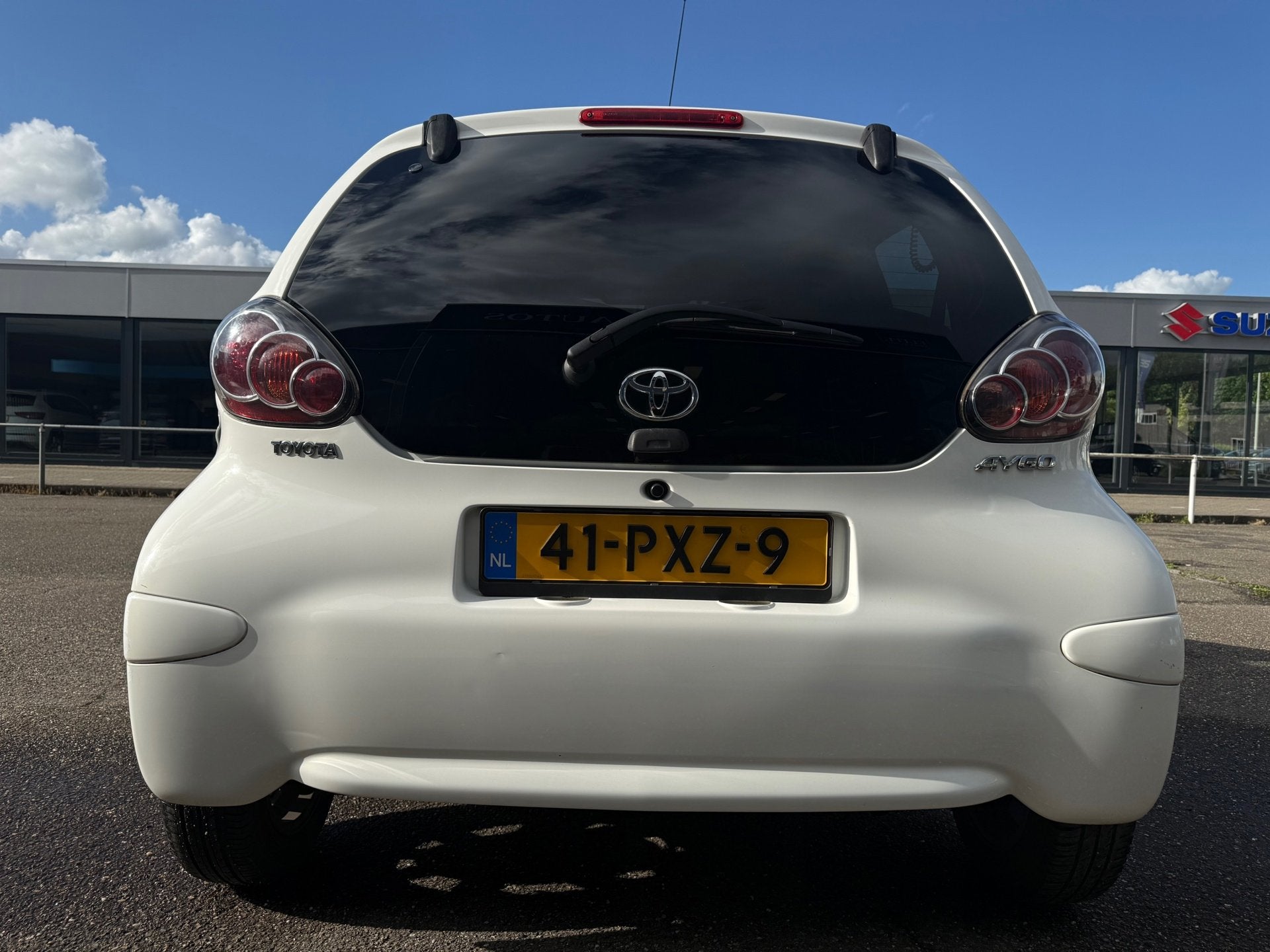 Toyota Aygo 1.0-12V Dynamic Navigator I Airco I Navigatie I, Auto's, Voorwielaandrijving, Euro 5, Stof, Gebruikt