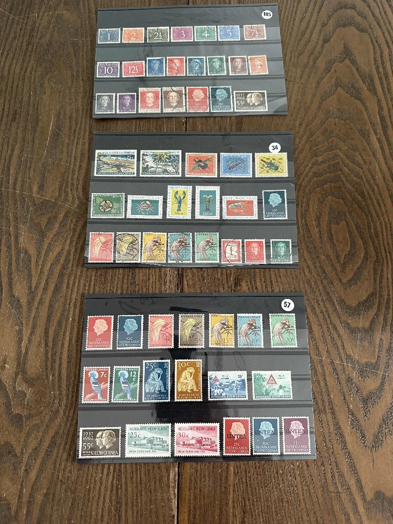postzegels Nieuw-Guinea kleine collectie kaart 34+57+185, Verzenden, Nieuw-Guinea