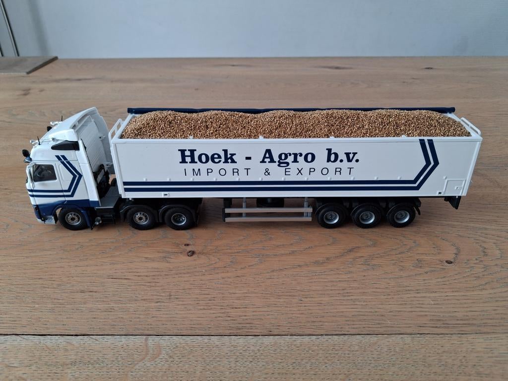 Tekno Volvo FH2 HoekTrans met bandlosoplegger, Hobby en Vrije tijd, Modelauto's | 1:50, Ophalen of Verzenden, Bus of Vrachtwagen