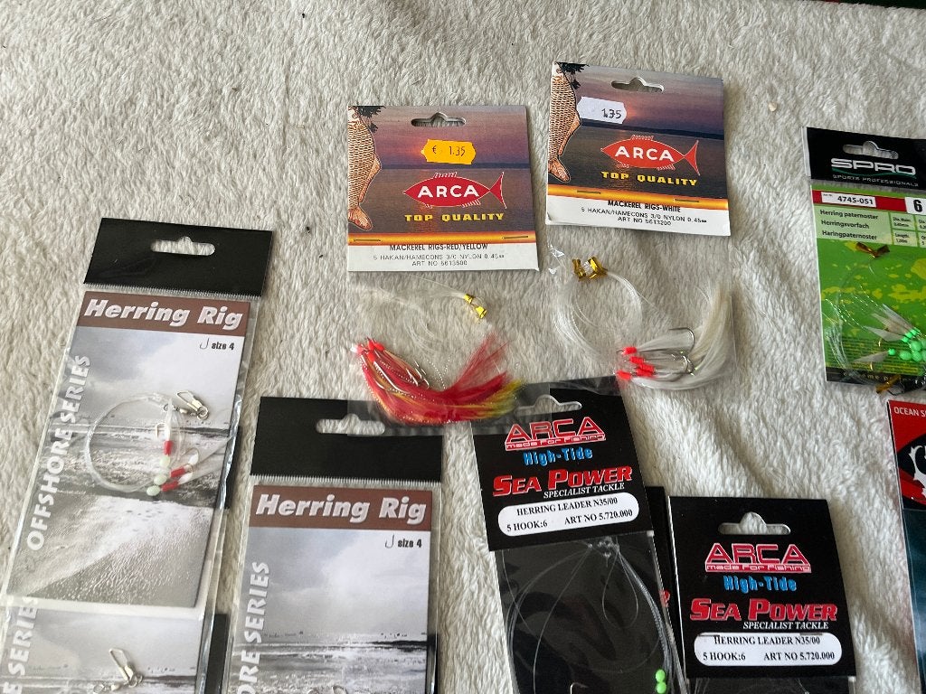adv 69 / NIEUW mixset 24 pakjes diverse zeevis onderlijnen, Ophalen of Verzenden, Nieuw, Haak
