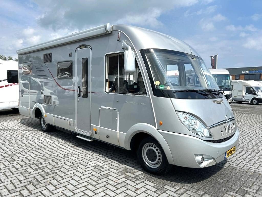 Hymer B 660 SL Integraal camper - Ruim en compleet, Caravans en Kamperen, Integraal, ABS, 7 tot 8 meter, Elektrische ramen