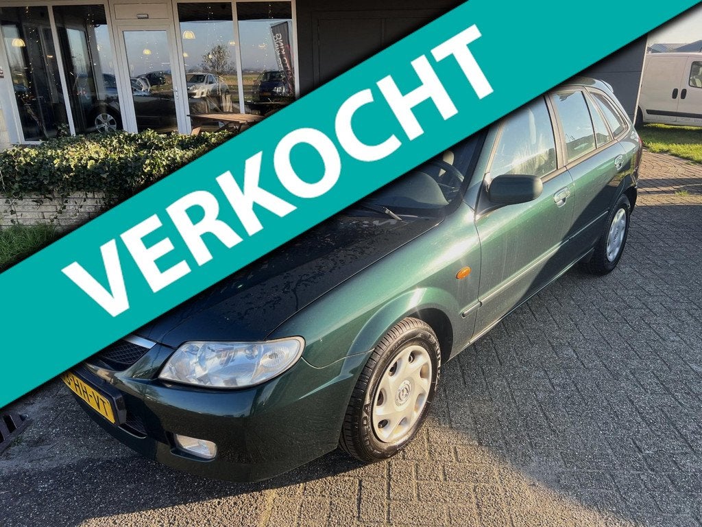 Mazda 323 Fastbreak 1.6i Exclusive AC I STRB I CV I APK+NAP, Auto's, Mazda, Metallic lak, Stof, Gebruikt, Zwart