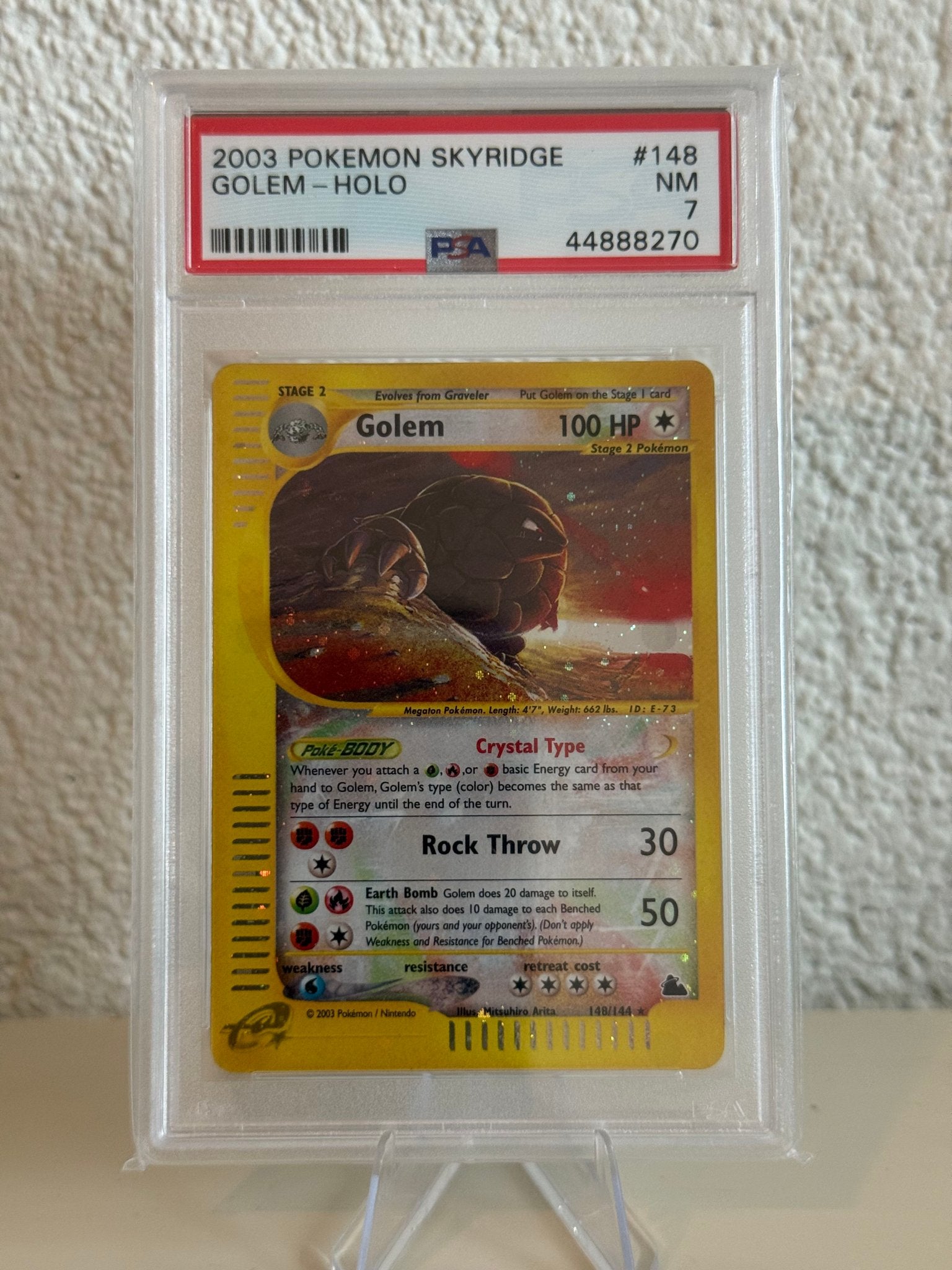 Pokemon Golem | PSA 7 | 148/144 | 44888270, Hobby en Vrije tijd, Ophalen of Verzenden, Zo goed als nieuw, Losse kaart