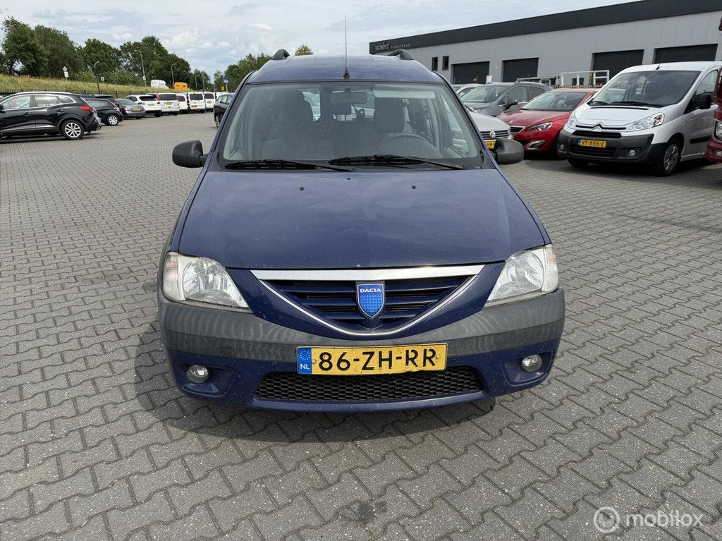 Dacia Logan MCV 1.6 Ambiance 7persoons, Auto's, Dacia, Stof, Gebruikt, Zwart, 4 cilinders