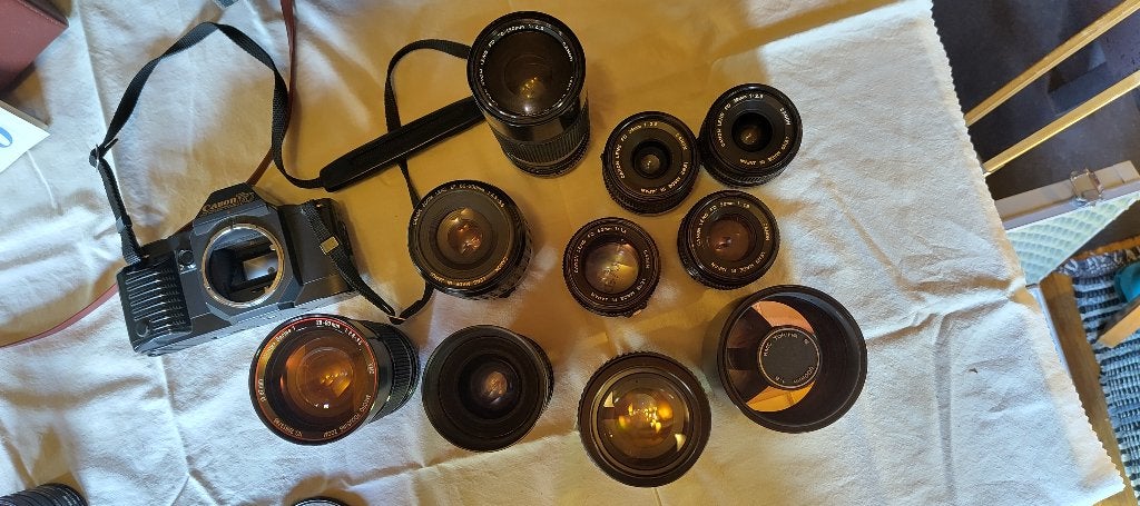 Canon T70 met diverse lenzen, filters en camerarugzak., Ophalen, Gebruikt, Spiegelreflex, Canon