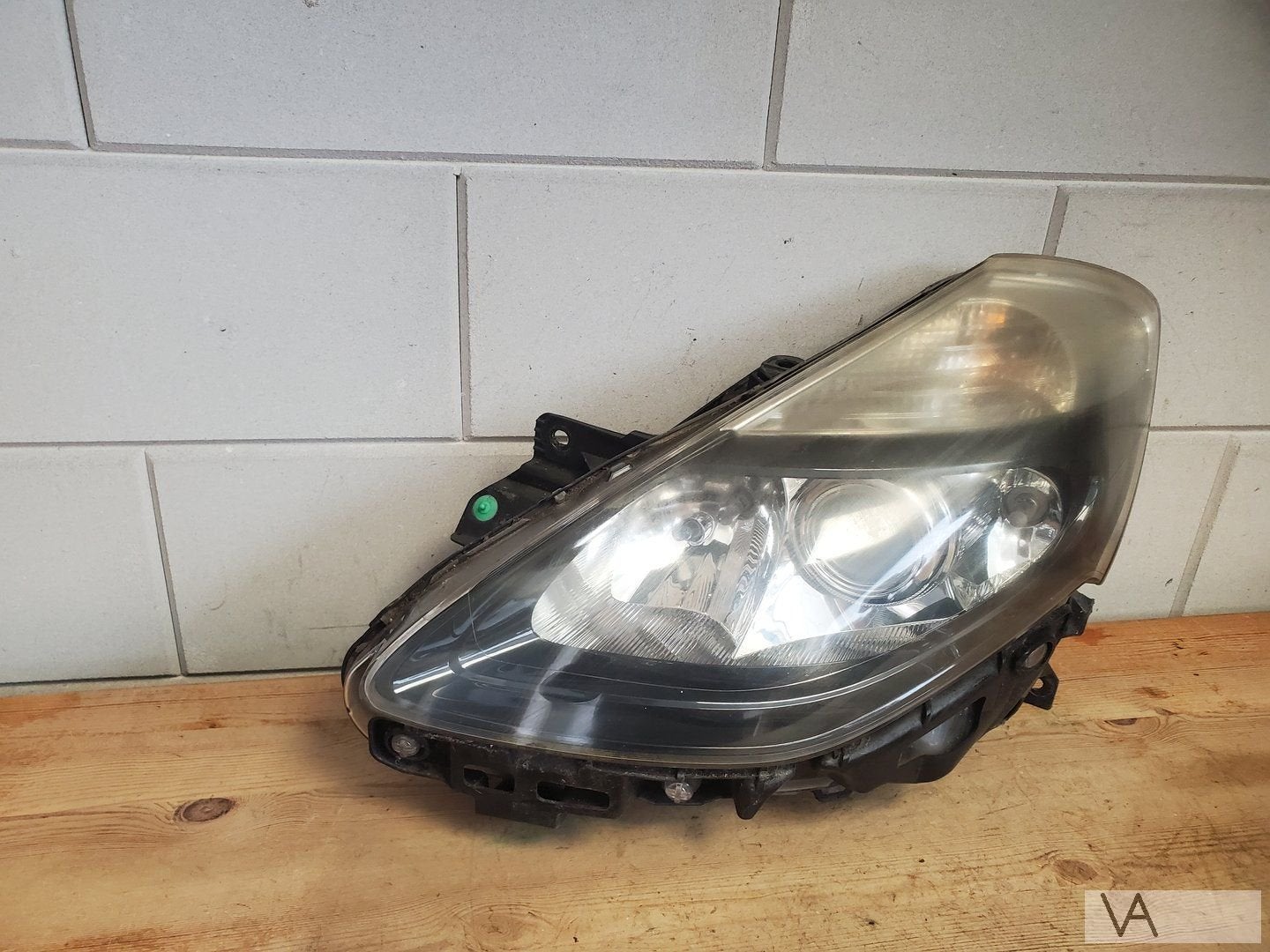 Renault Clio 3 facelift koplamp links 2009 - 2013 beetje dof, Gebruikt, -, Renault, -
