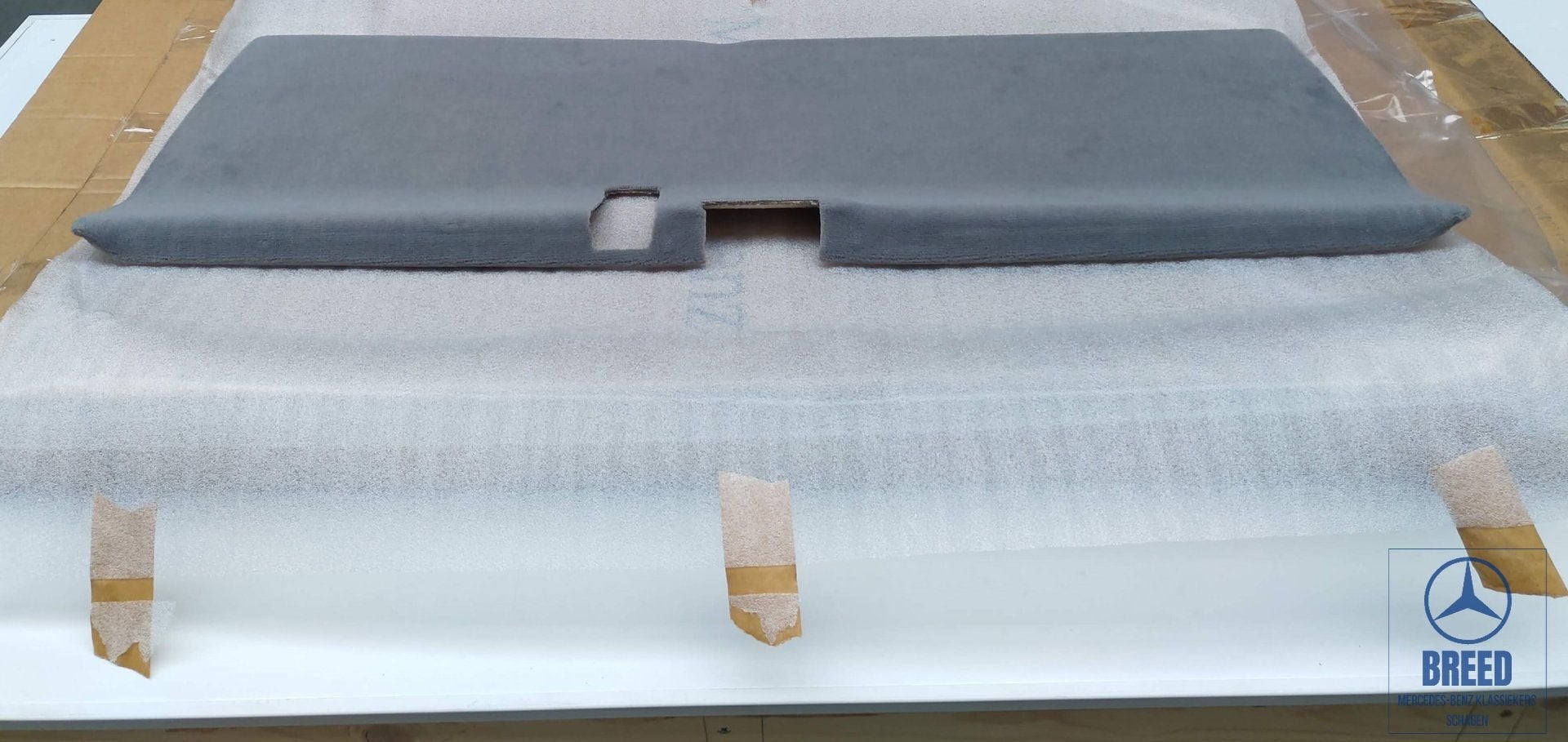 NOS bekleding achterklep grijs voor Mercedes W124 T-model, Auto-onderdelen, Interieur en Bekleding, -, Nieuw, Ophalen of Verzenden