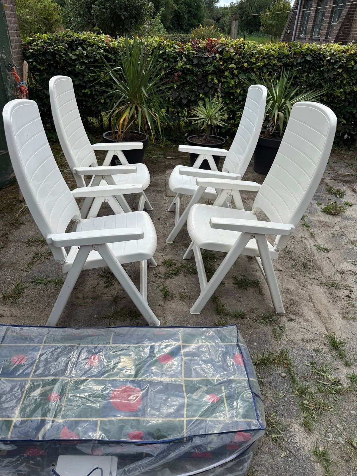 4x Flair kunstof tuinstoelen met kussens, Ophalen, Gebruikt, Kunststof, Inklapbaar