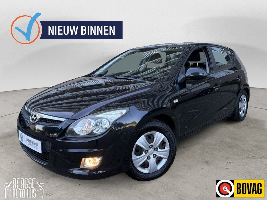 Hyundai i30 1.6i Dynamic Cruise Clima Elek.R (bj 2010), Auto's, 127 pk, Dealer onderhouden, Stof, Gebruikt