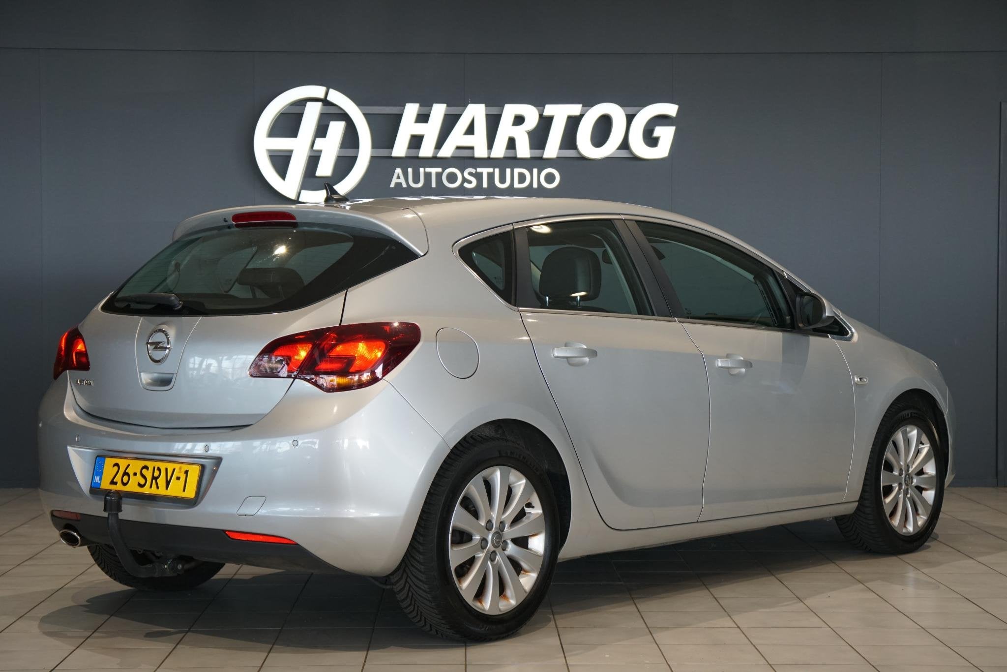 Opel Astra 1.4 Turbo Cosmo + TREKHAAK / SENSOREN / CLIMATE C, Auto's, Opel, Voorwielaandrijving, Euro 5, Stof, Gebruikt