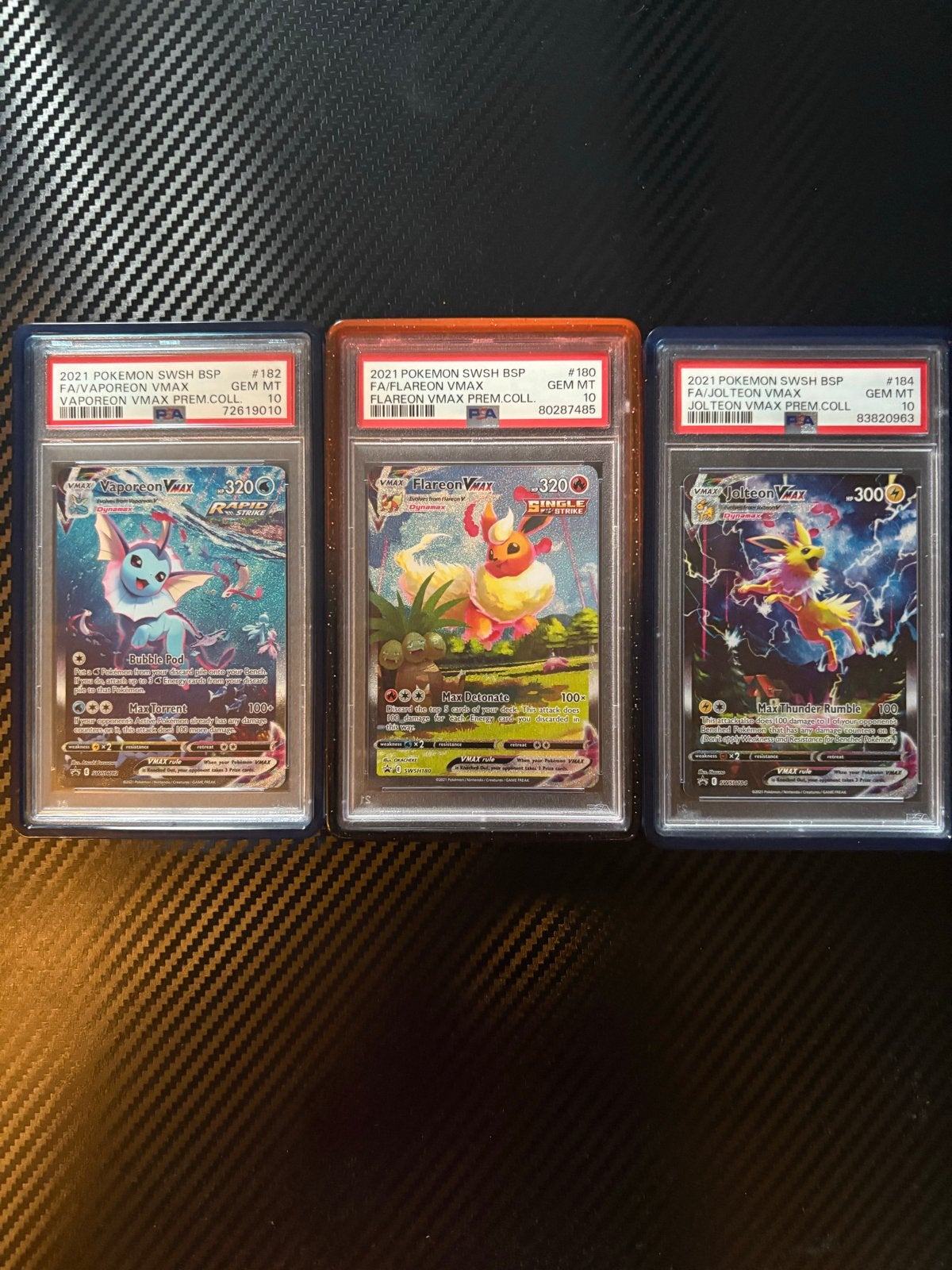 PSA 10 Vaporeon, Flareon, Jolteon VMAX Premium Collection, Hobby en Vrije tijd, Ophalen of Verzenden, Zo goed als nieuw, Meerdere kaarten