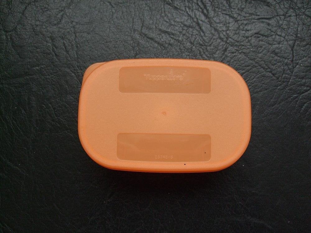 1x Tupperware, Frisdoosje, mini ruimtemaker oranje, Oranje, Ophalen of Verzenden, Zo goed als nieuw, Bus of Trommel