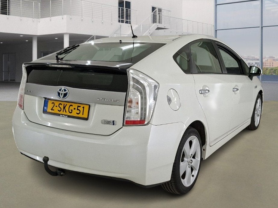 Toyota Prius 1.8 Plug-in Aspiration Automaat +NAP NL-auto, Auto's, Euro 5, Gebruikt, Leder en Stof, Wit