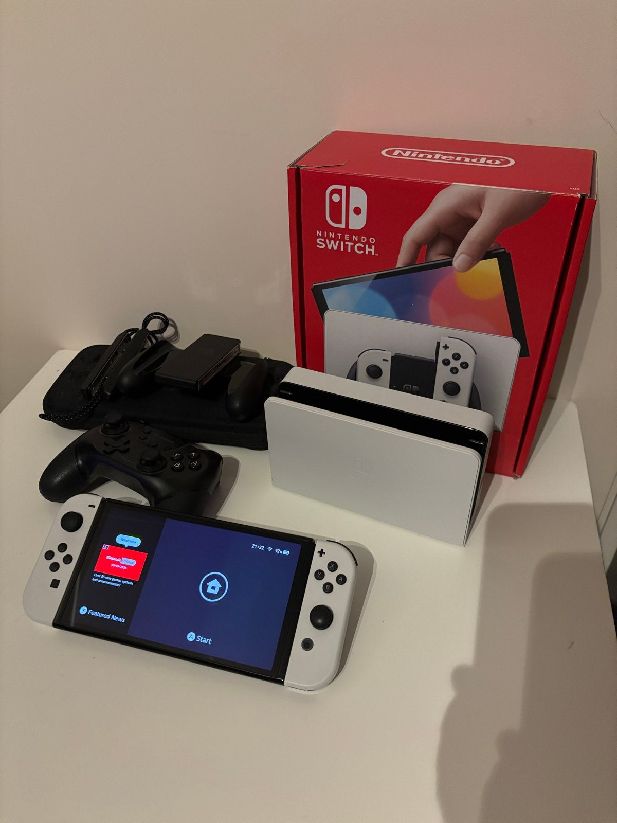 Nintendo Switch OLED met extra controller en game