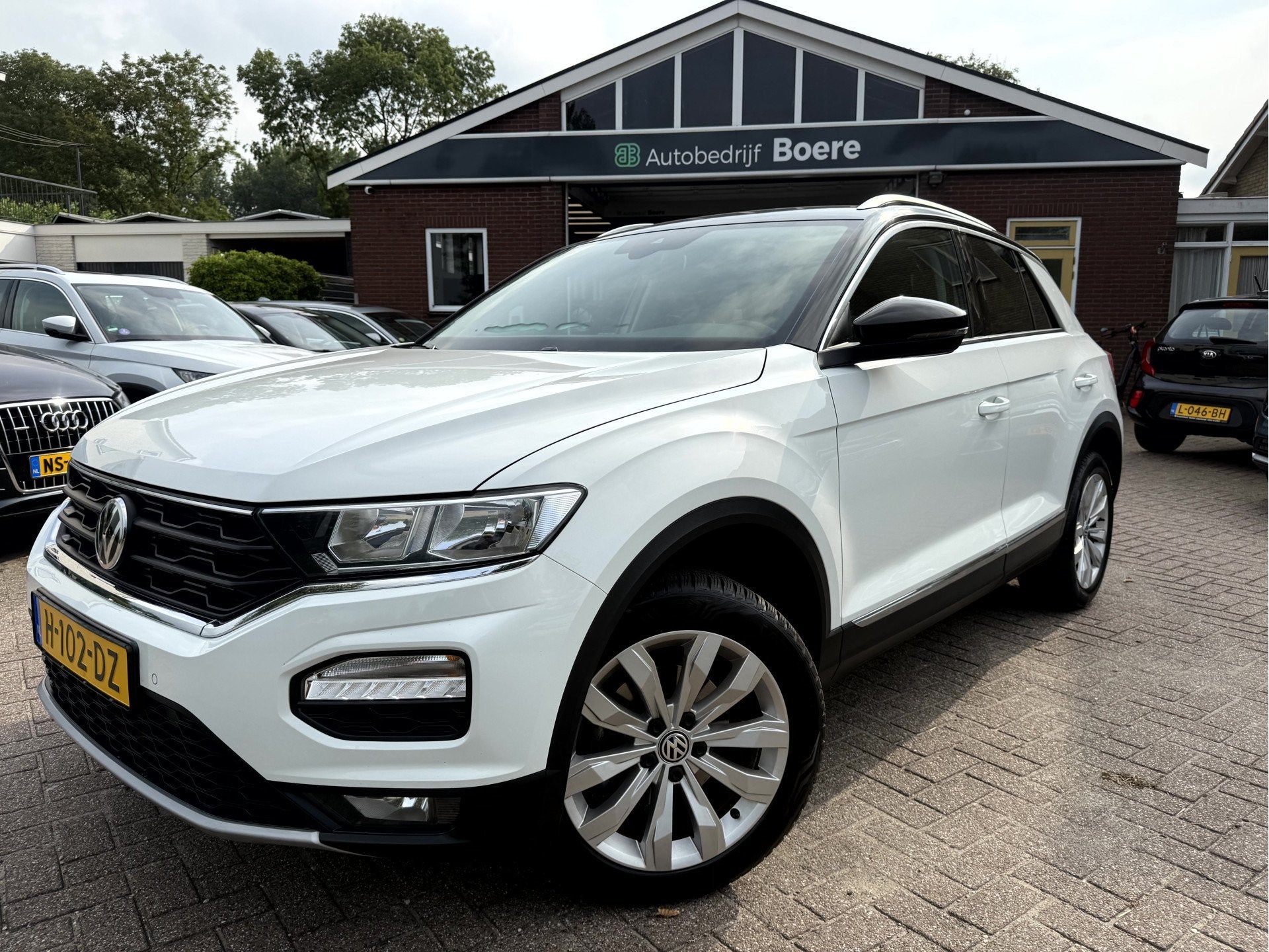 Volkswagen T-Roc 1.5 TSI 150pk Style Business Camera, 17''Lm, Auto's, Volkswagen, Stof, 4 cilinders, 150 pk, Wit