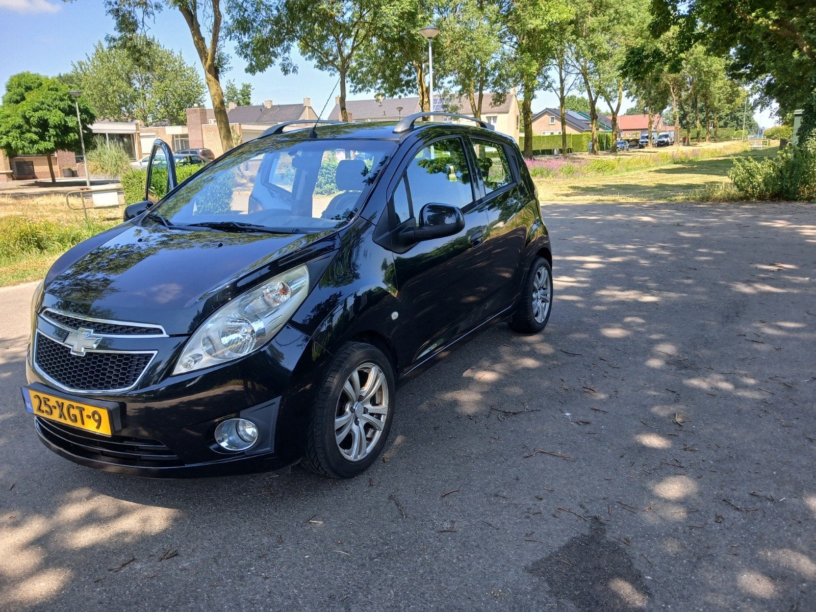 Chevrolet Spark 1.0 Bifuel 2012 Zwart, Auto's, Chevrolet, 15 km/l, 37 €/maand, 4 cilinders, Zwart