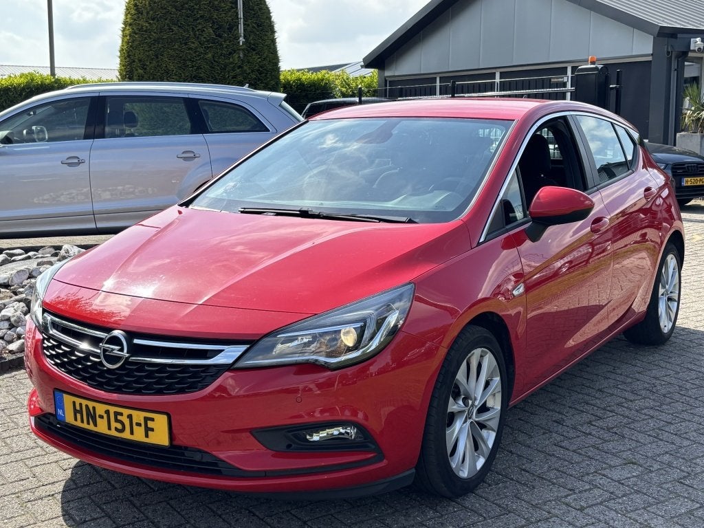 Opel Astra 1.4 Turbo 5-Deurs Rood 2015 Nieuw Model, Auto's, Voorwielaandrijving, Stof, Gebruikt, Euro 6