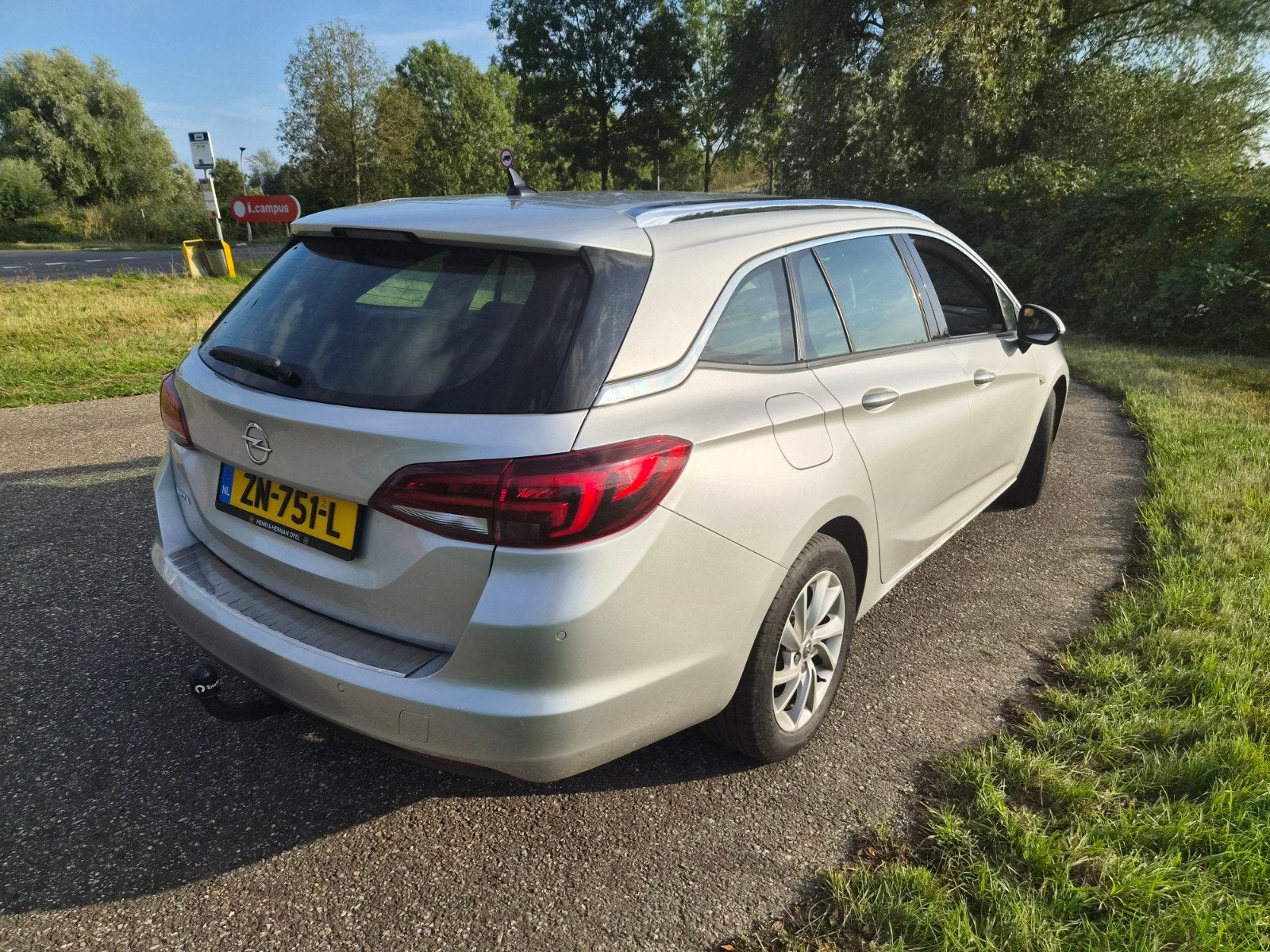 Opel Astra 1.4 Turbo 150pk Start/stop 2019 Grijs +trekhaak, Auto's, Voorwielaandrijving, 15 km/l, Origineel Nederlands, Stationwagon