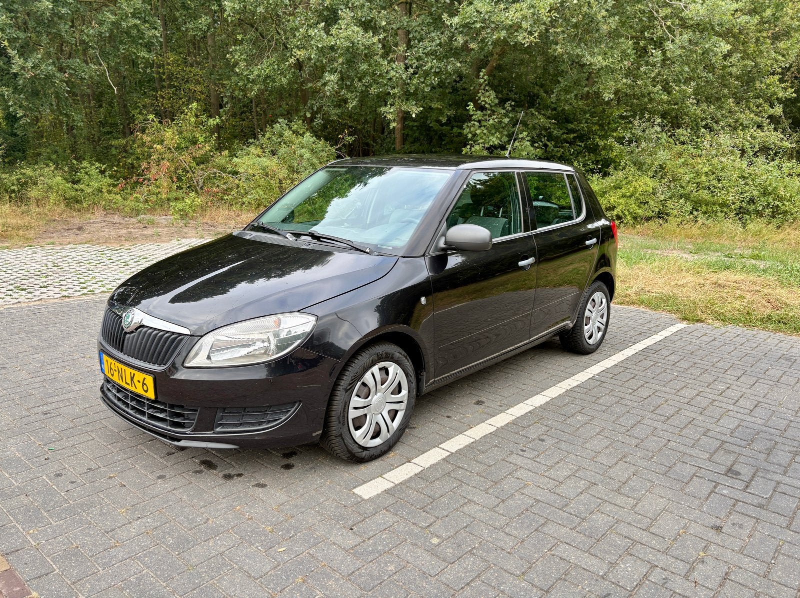 Skoda Fabia 1.2 TSI 63KW 2010 Zwart, Auto's, Voorwielaandrijving, Stof, 40 €/maand, 4 cilinders