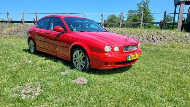 Jaguar X-Type 2.5 V6 Executive 4WD 2002 Rood, Auto's, 196 pk, 2495 cc, Bedrijf, Handgeschakeld