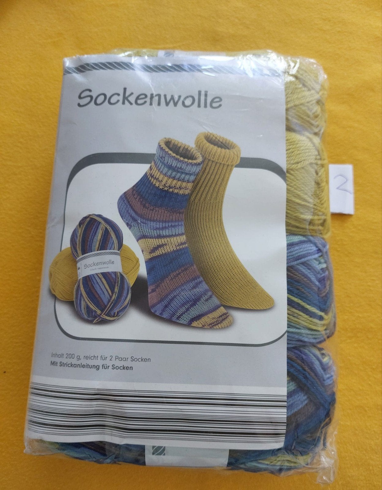 Sokkenwol pakket geel en blauw gemêleerd, Ophalen of Verzenden, Nieuw, Haken, Wol of Garen