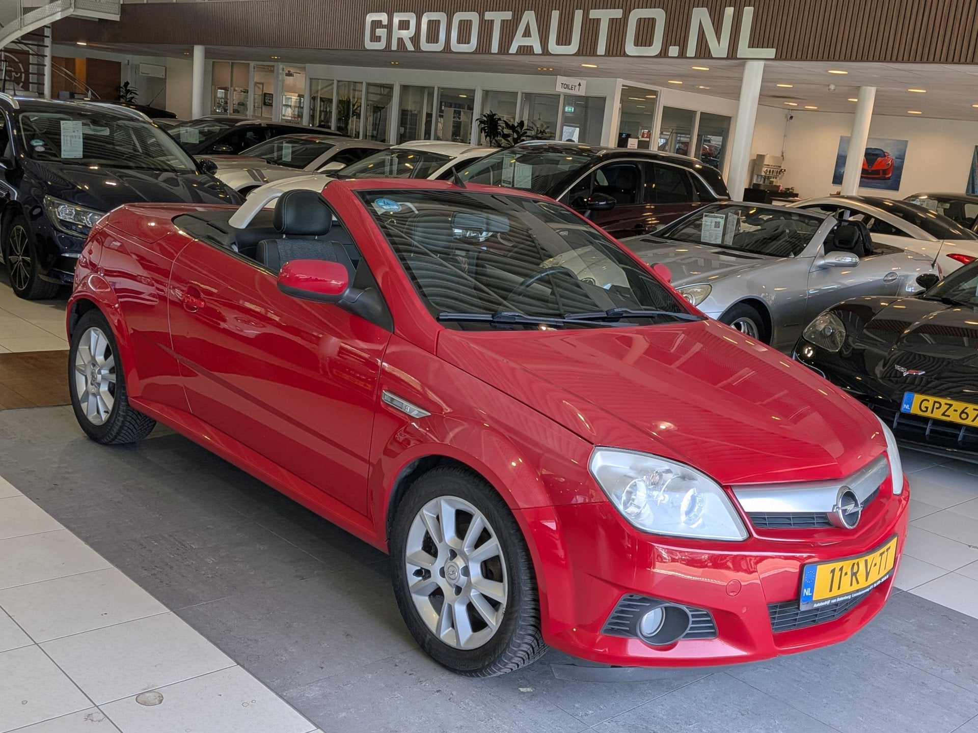 Opel Tigra TwinTop 1.4-16V Sport NAP, Cruise Control, Stuurb, Voorwielaandrijving, Gebruikt, Zwart, 4 cilinders