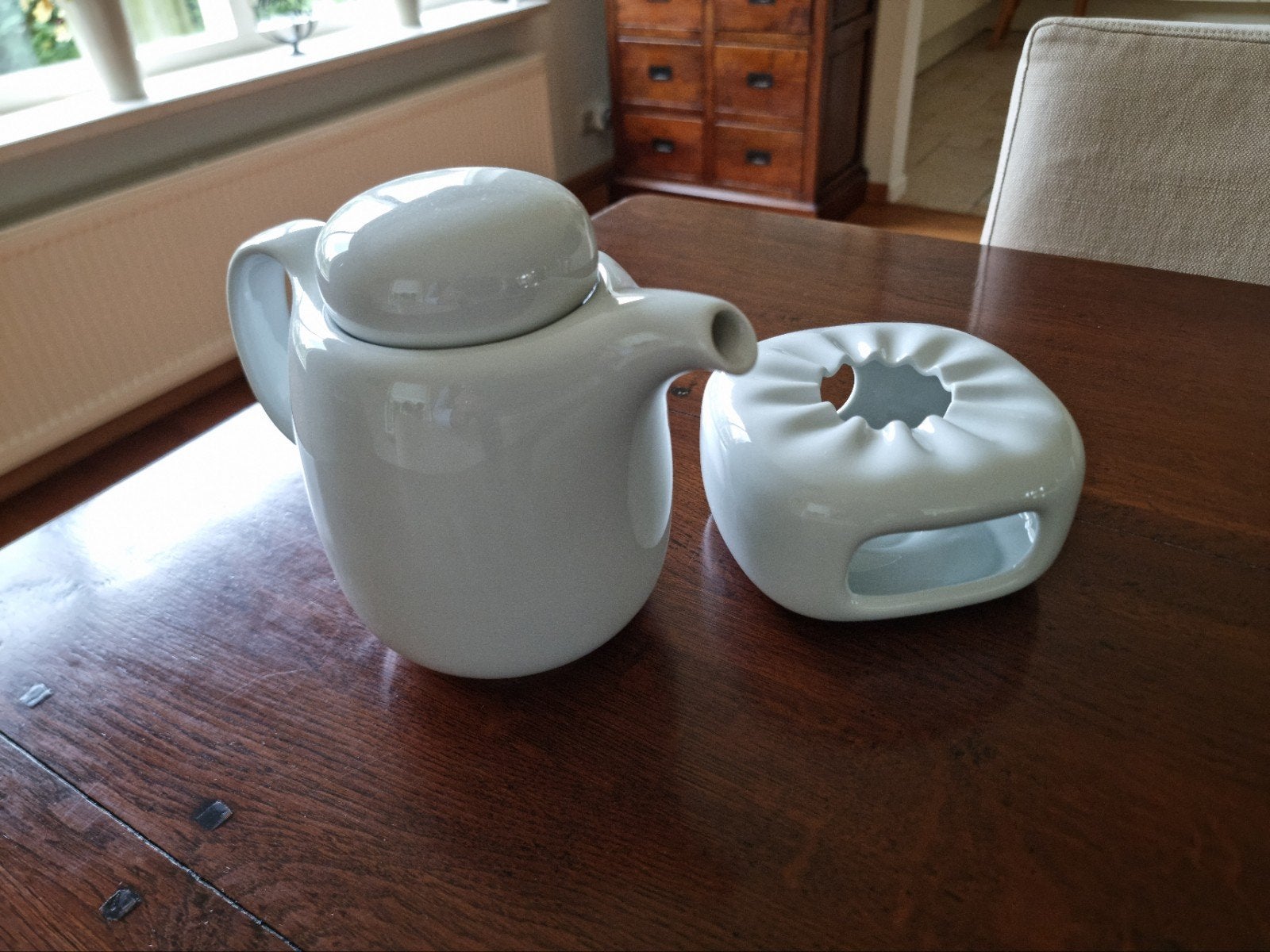 Porseleinen theepot met theelichtje., Antiek en Kunst, Ophalen
