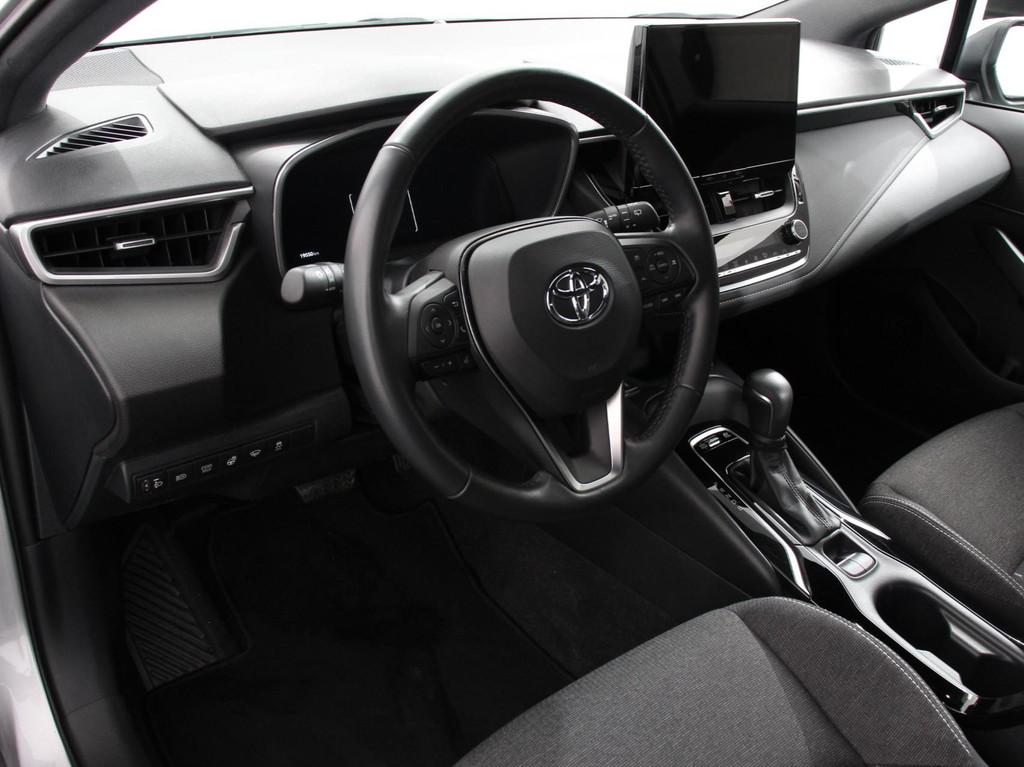 Toyota Corolla Touring Sports Automaat Hybrid 140 Active DEM, Auto's, Toyota, Gebruikt, 4 cilinders, Corolla, Hybride Elektrisch/Benzine