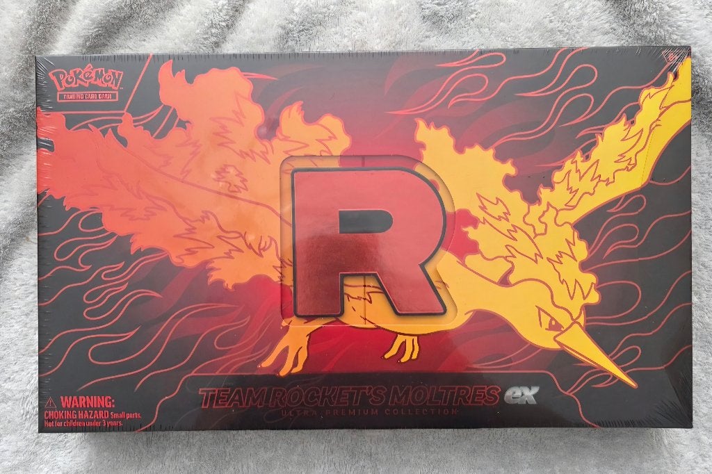 Team Rocket's Moltres Ex UPC / Ultra Premium Collection, Ophalen of Verzenden, Nieuw