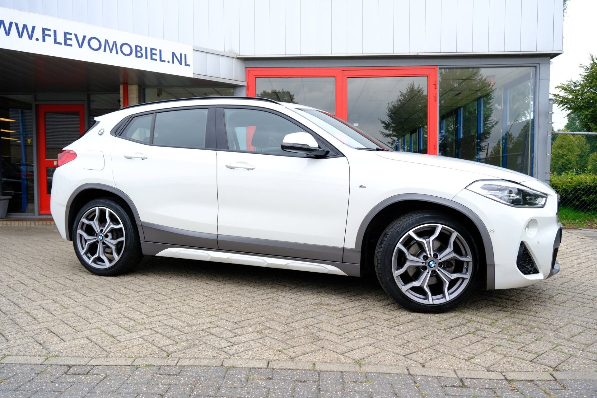 BMW X2 SDrive18i M Sport Aut. Leder|HUD|Sportstoelen|19" LMV, Auto's, X2, Gebruikt, Euro 6, Wit