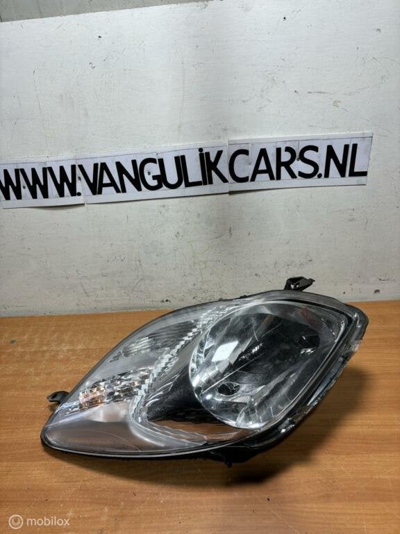 Koplamp  rechts Toyota Yaris II ('05-'11, Auto-onderdelen, Verlichting, Toyota, Gebruikt, Ophalen of Verzenden