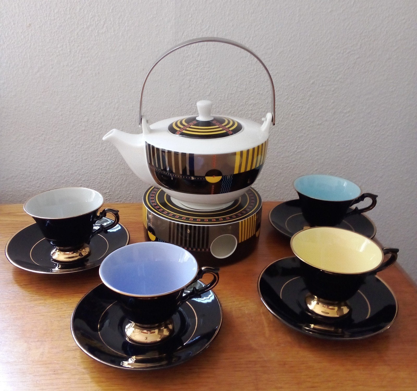 Theepot met theelicht en 4 kop en schotels, Ophalen of Verzenden