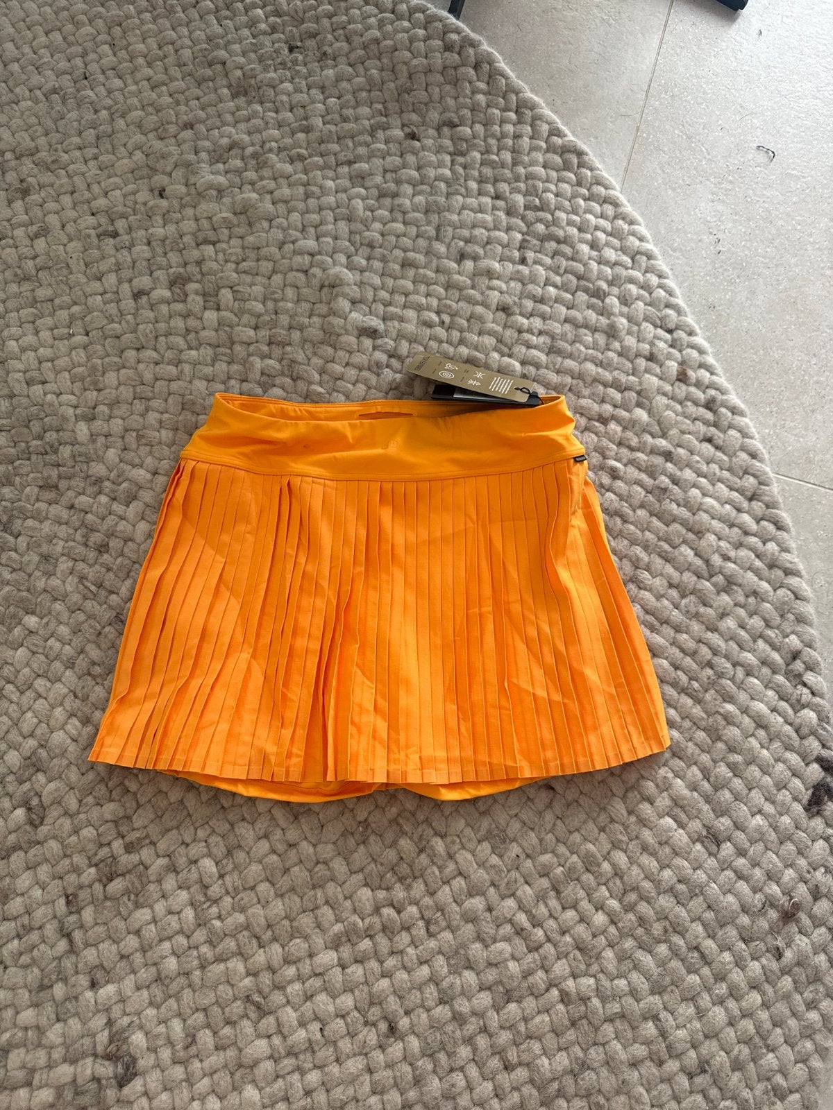 Goldbergh Active Plissé Rok - Nieuw met kaartjes, Ophalen of Verzenden, Nieuw, Maat 42/44 (L), Oranje